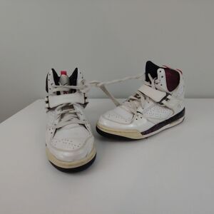 Youth girls 6 Air Jordan high top tennis shoe